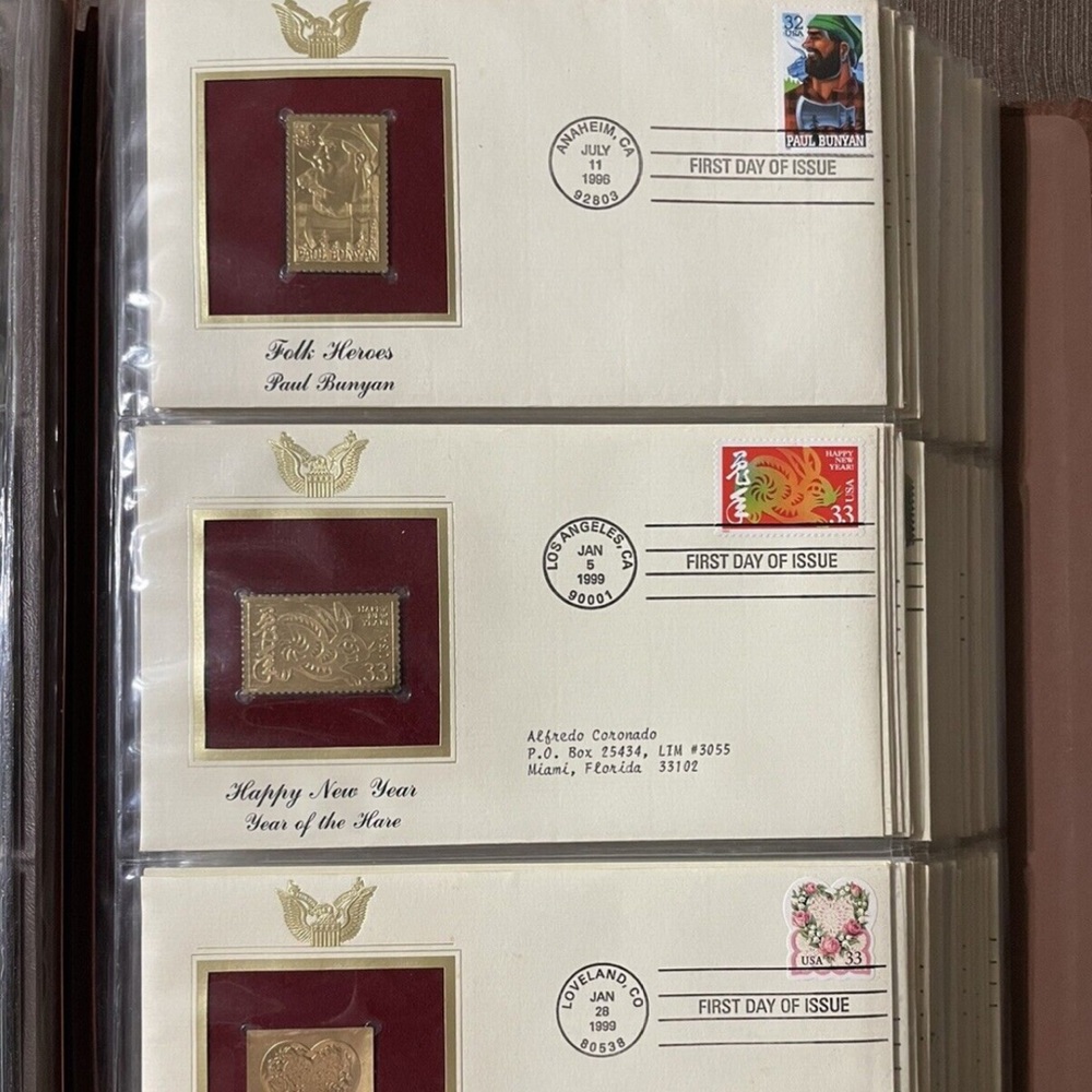 Huge collection gold replica stamps 1990 to 2003 mint condition in sleeved books